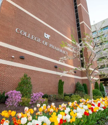 Pharmacy-Building-flowers-e1687817874821